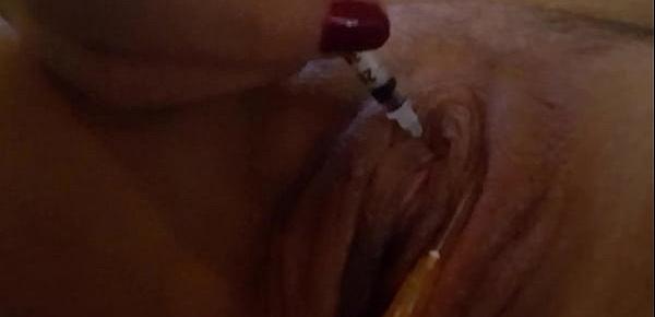  Hurting my sensitive clit with a small needle